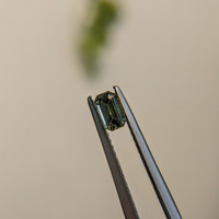 0.41 Ct. Bluish Green Sapphire from Madagascar Life Style