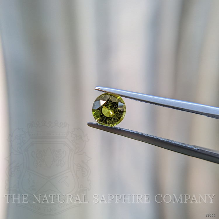 0.88 Ct. Yellowish Green Sapphire from Ceylon (Sri Lanka)