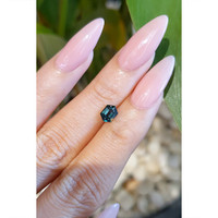 0.79 Ct. Bluish Green Sapphire from Madagascar Life Style