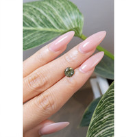 1.67 Ct. Yellowish Green Sapphire from Montana Life Style