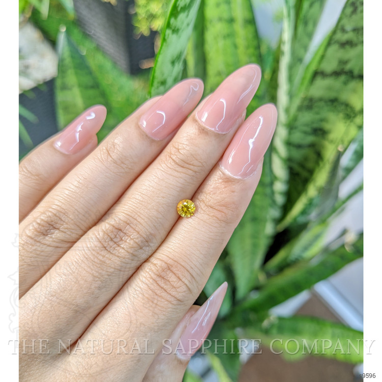 0.48 Ct. Orangish Yellow Sapphire from Ceylon (Sri Lanka)