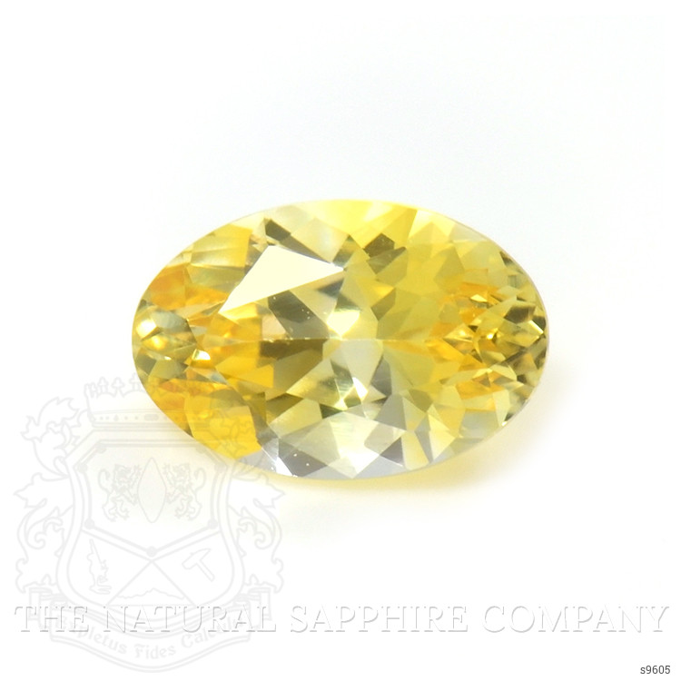0.56 Ct. Orangish Yellow Sapphire from Ceylon (Sri Lanka)