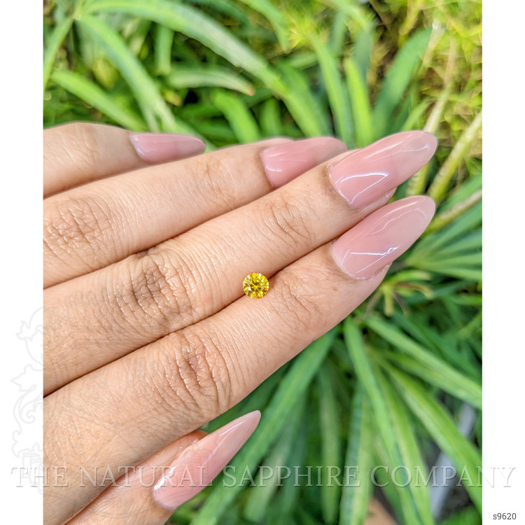 0.46 Ct. Orangish Yellow Sapphire from Ceylon (Sri Lanka)