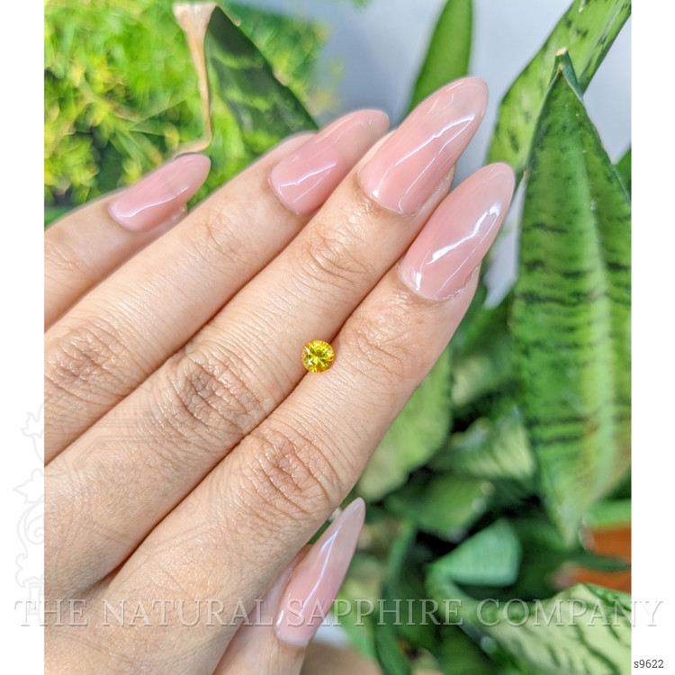 0.46 Ct. Orangish Yellow Sapphire from Ceylon (Sri Lanka)