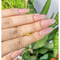 0.46 Ct. Orangish Yellow Sapphire from Ceylon (Sri Lanka) Life Style