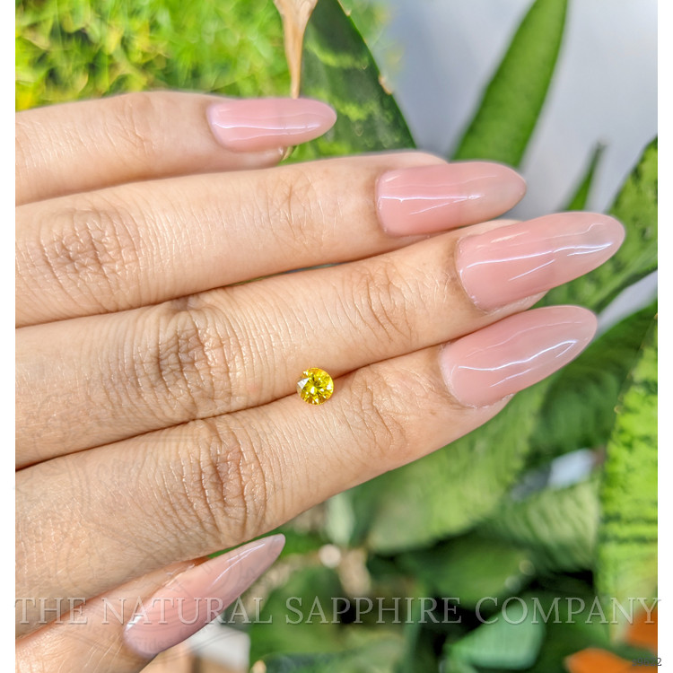 0.46 Ct. Orangish Yellow Sapphire from Ceylon (Sri Lanka)