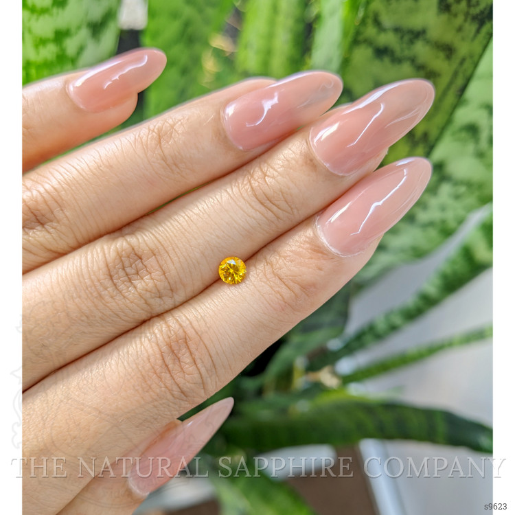 0.47 Ct. Orangish Yellow Sapphire from Ceylon (Sri Lanka)