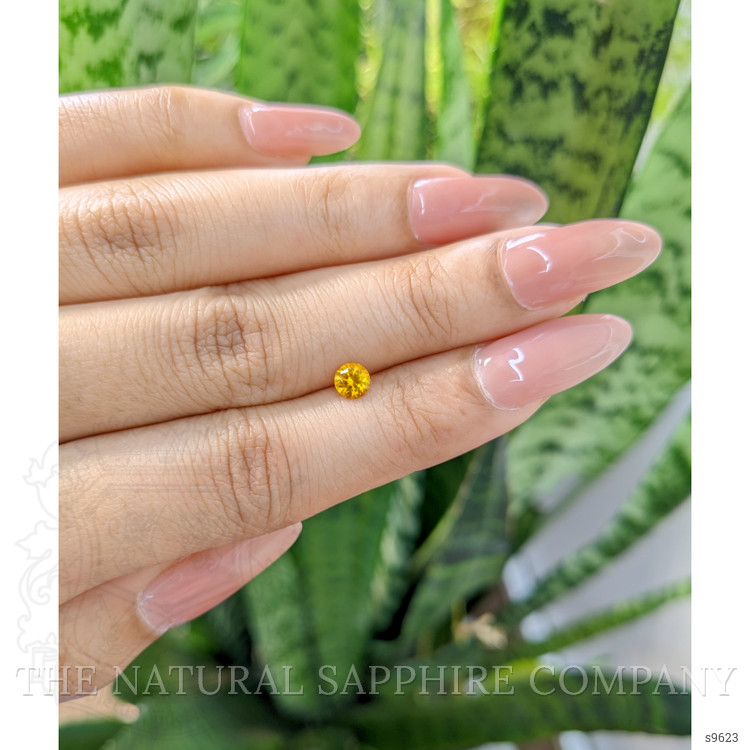 0.47 Ct. Orangish Yellow Sapphire from Ceylon (Sri Lanka)