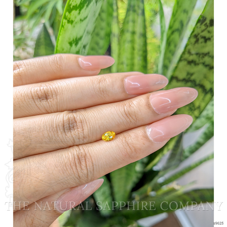 0.64 Ct. Orangish Yellow Sapphire from Ceylon (Sri Lanka)