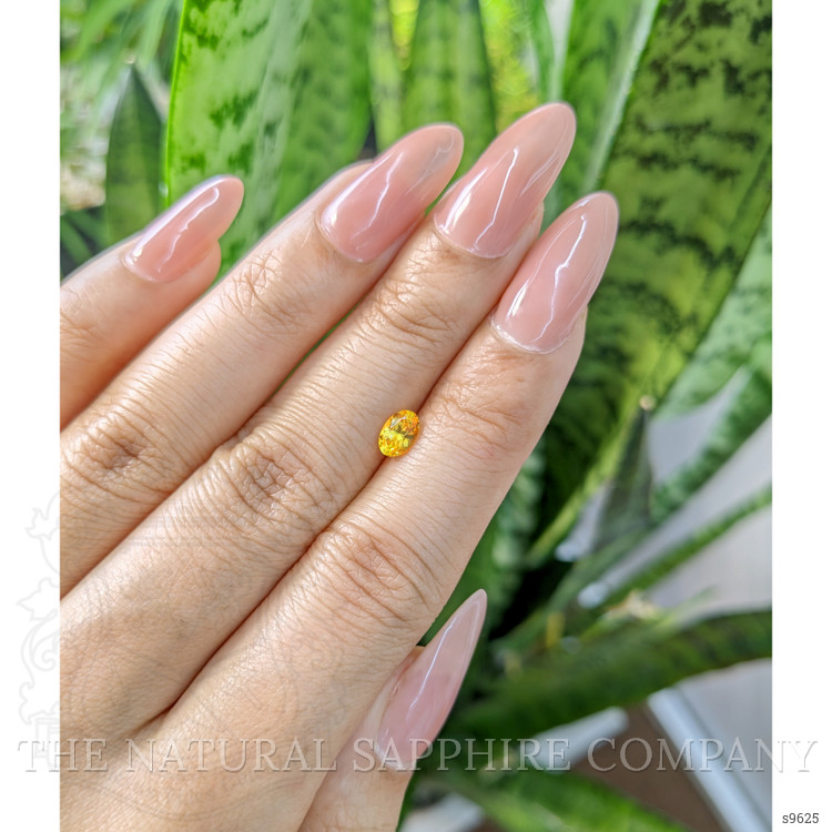 0.64 Ct. Orangish Yellow Sapphire from Ceylon (Sri Lanka)