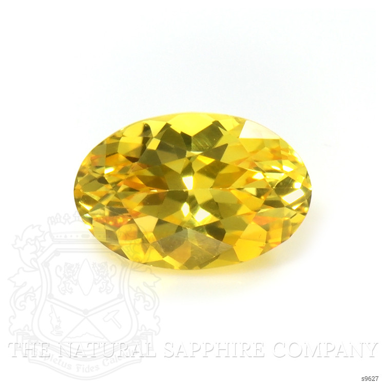 0.59 Ct. Orangish Yellow Sapphire from Ceylon (Sri Lanka)