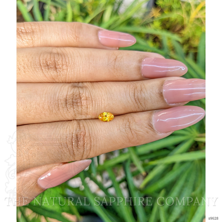 0.48 Ct. Yellowish Orange Sapphire from Ceylon (Sri Lanka)