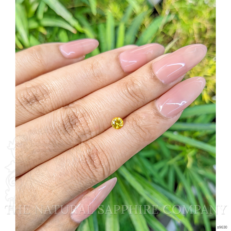 0.41 Ct. Orangish Yellow Sapphire from Ceylon (Sri Lanka)