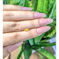 0.51 Ct. Orangish Yellow Sapphire from Ceylon (Sri Lanka) Life Style