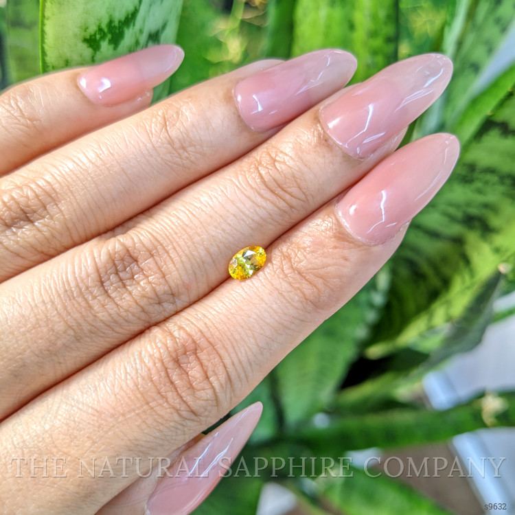 0.51 Ct. Orangish Yellow Sapphire from Ceylon (Sri Lanka)