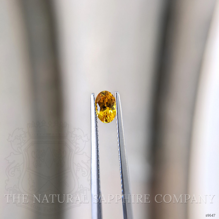 0.56 Ct. Yellowish Orange Sapphire from Ceylon (Sri Lanka)