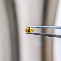 0.56 Ct. Yellowish Orange Sapphire from Ceylon (Sri Lanka) Life Style