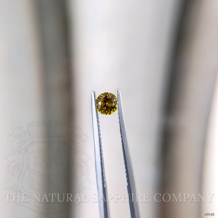 0.42 Ct. Orangish Yellow Sapphire from Ceylon (Sri Lanka)