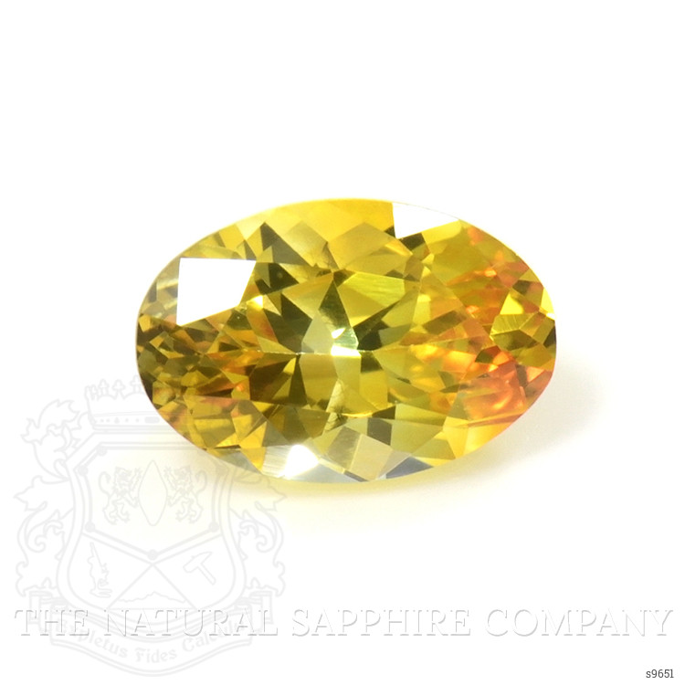0.57 Ct. Orangish Yellow Sapphire from Ceylon (Sri Lanka)