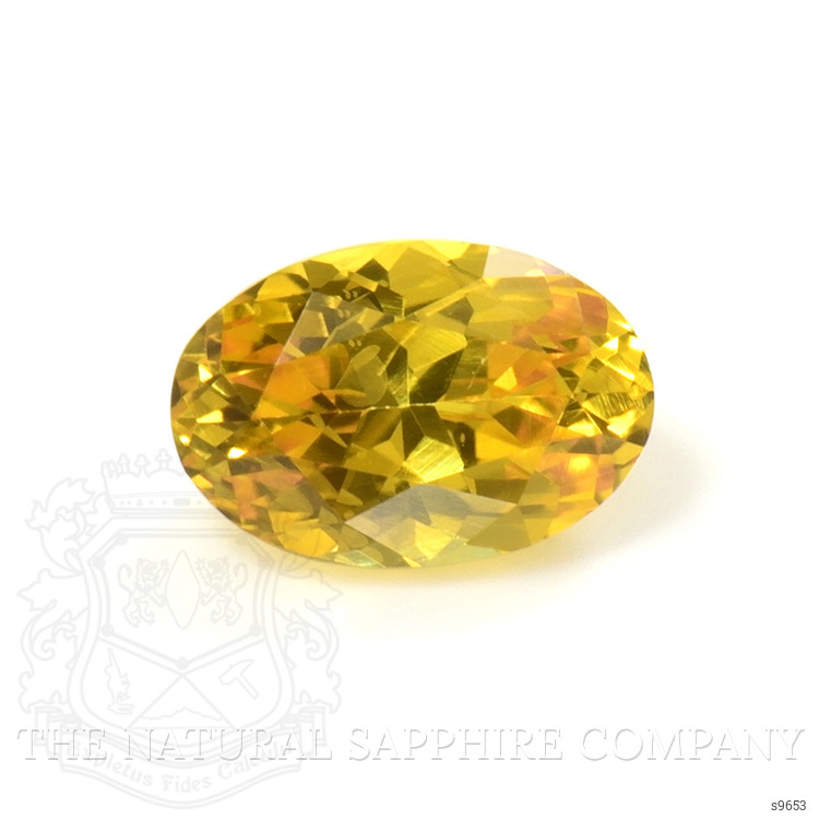 0.61 Ct. Orangish Yellow Sapphire from Ceylon (Sri Lanka)