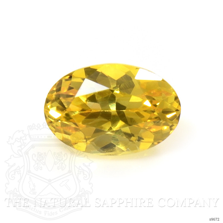 0.63 Ct. Orangish Yellow Sapphire from Ceylon (Sri Lanka)