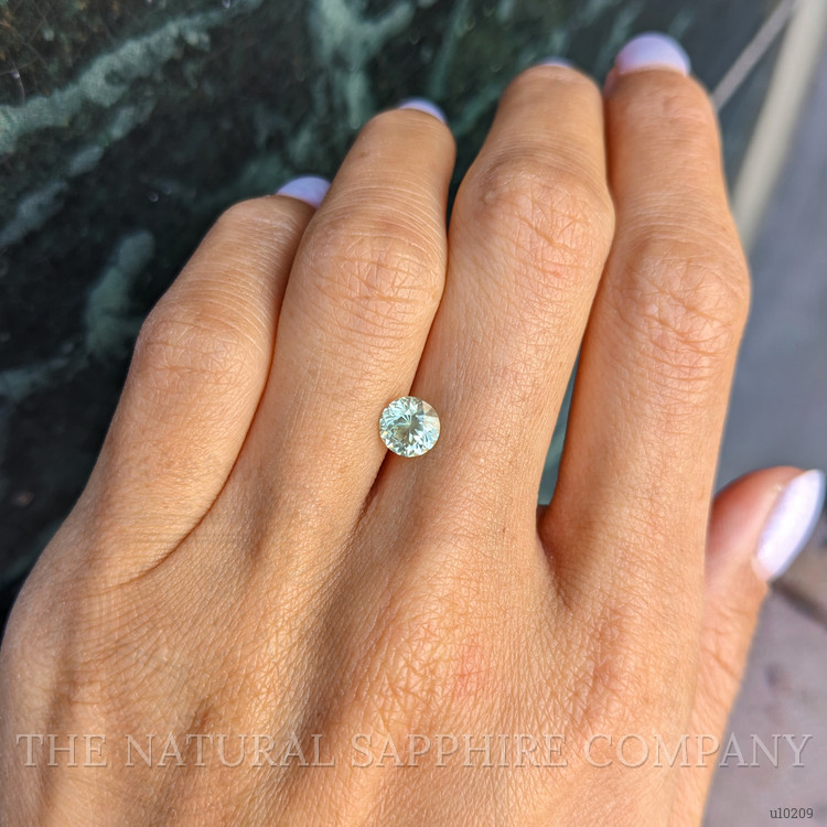 1.34 Ct. Greenish Yellow Sapphire from Montana