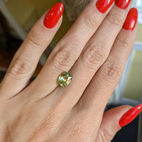 2.23 Ct. Yellowish Green Sapphire from Madagascar Life Style