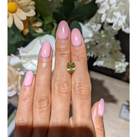2.23 Ct. Yellowish Green Sapphire from Madagascar Life Style