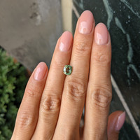 1.18 Ct. Yellowish Green Sapphire from Madagascar Life Style