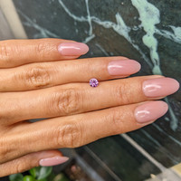 0.45 Ct. Pinkish Purple Sapphire from Ceylon (Sri Lanka) Life Style
