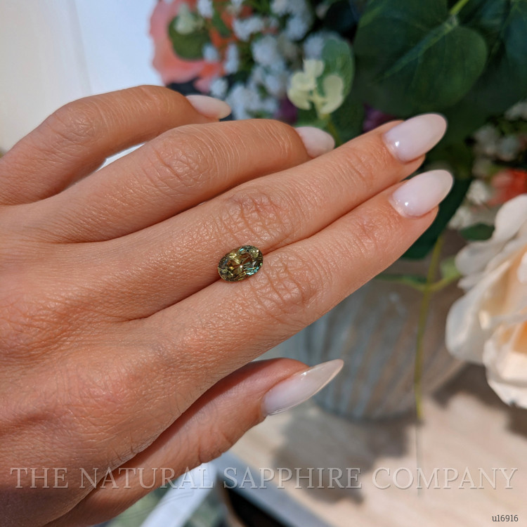 2.43 Ct. Yellowish Green Sapphire from Ceylon (Sri Lanka)