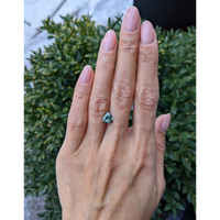 1.53 Ct. Greenish Brown Sapphire from Montana Life Style