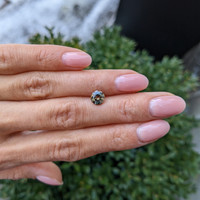 1.41 Ct. Greenish Brown Sapphire from Montana Life Style