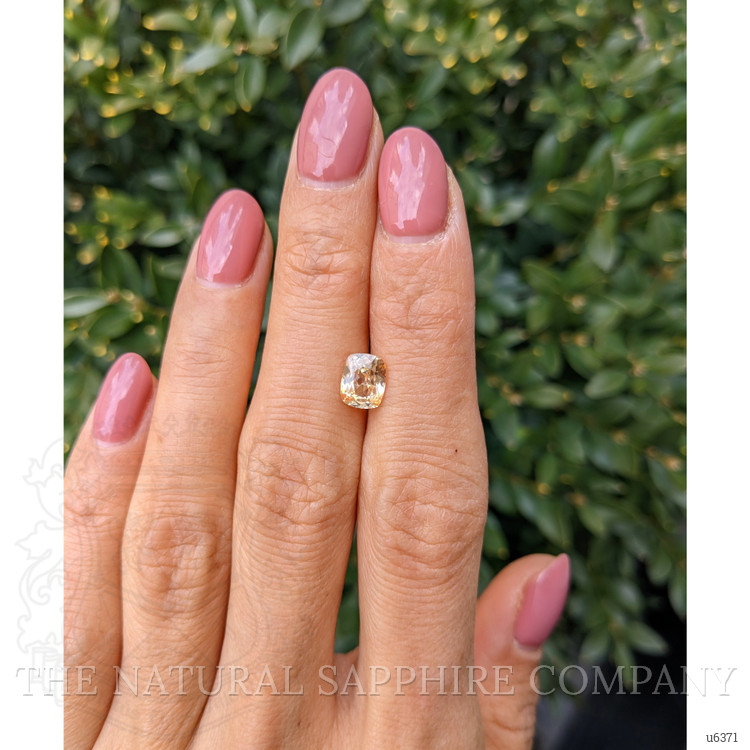 1.45 Ct. Orangish Yellow Sapphire from Ceylon (Sri Lanka)