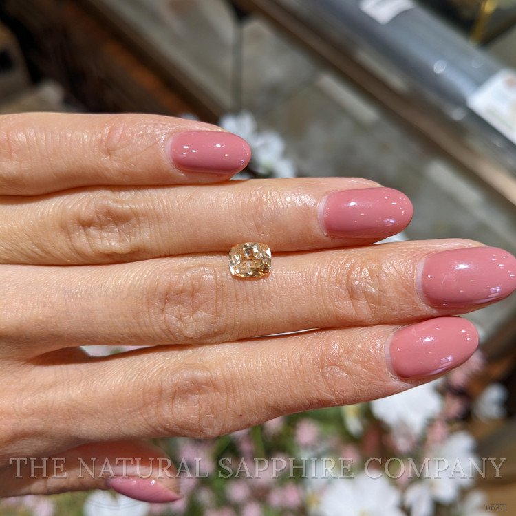 1.45 Ct. Orangish Yellow Sapphire from Ceylon (Sri Lanka)