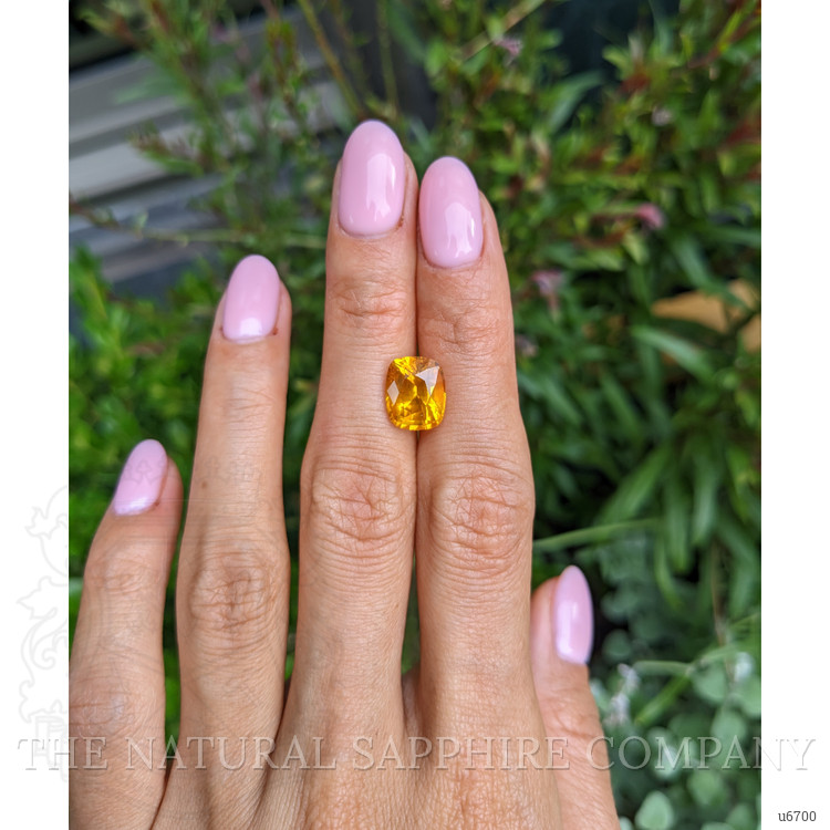 4.93 Ct. Orangish Yellow Sapphire from Ceylon (Sri Lanka)