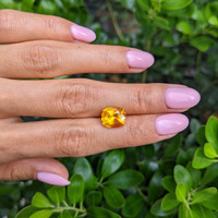 4.93 Ct. Orangish Yellow Sapphire from Ceylon (Sri Lanka) Life Style