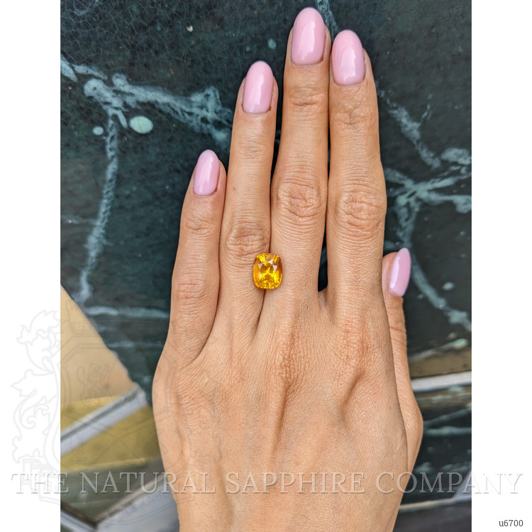 4.93 Ct. Orangish Yellow Sapphire from Ceylon (Sri Lanka)