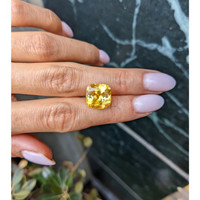 10.02 Ct. Orangish Yellow Sapphire from Ceylon (Sri Lanka) Life Style