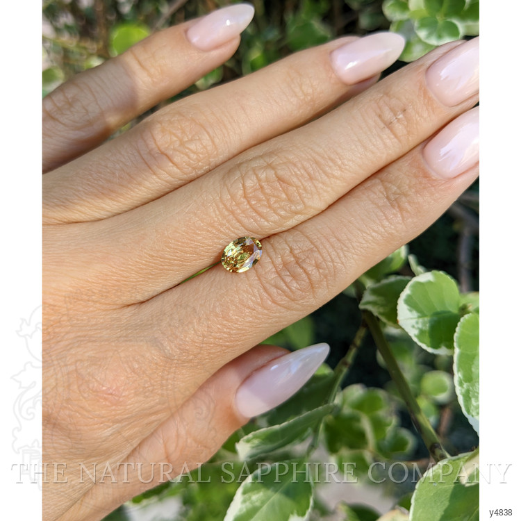 0.97 Ct. Orangish Yellow Sapphire from Ceylon (Sri Lanka)