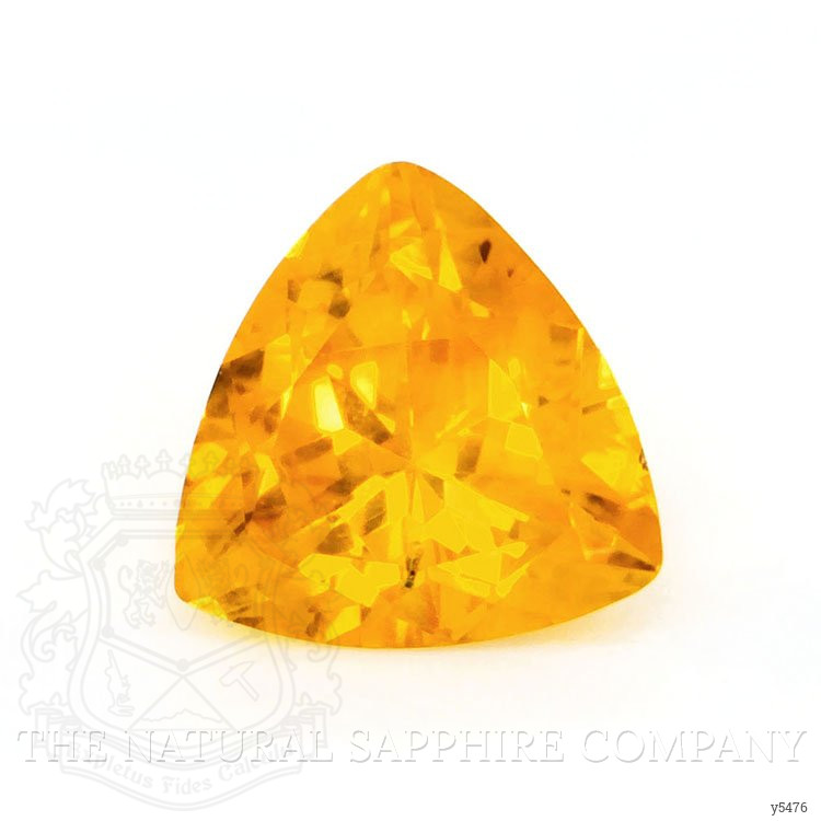 0.79 Ct. Orangish Yellow Sapphire from Ceylon (Sri Lanka)